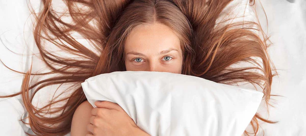 Girl with silky pillow